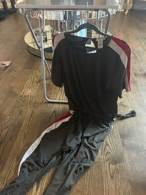 Black Jumpsuit with Red & White Stripe Accents